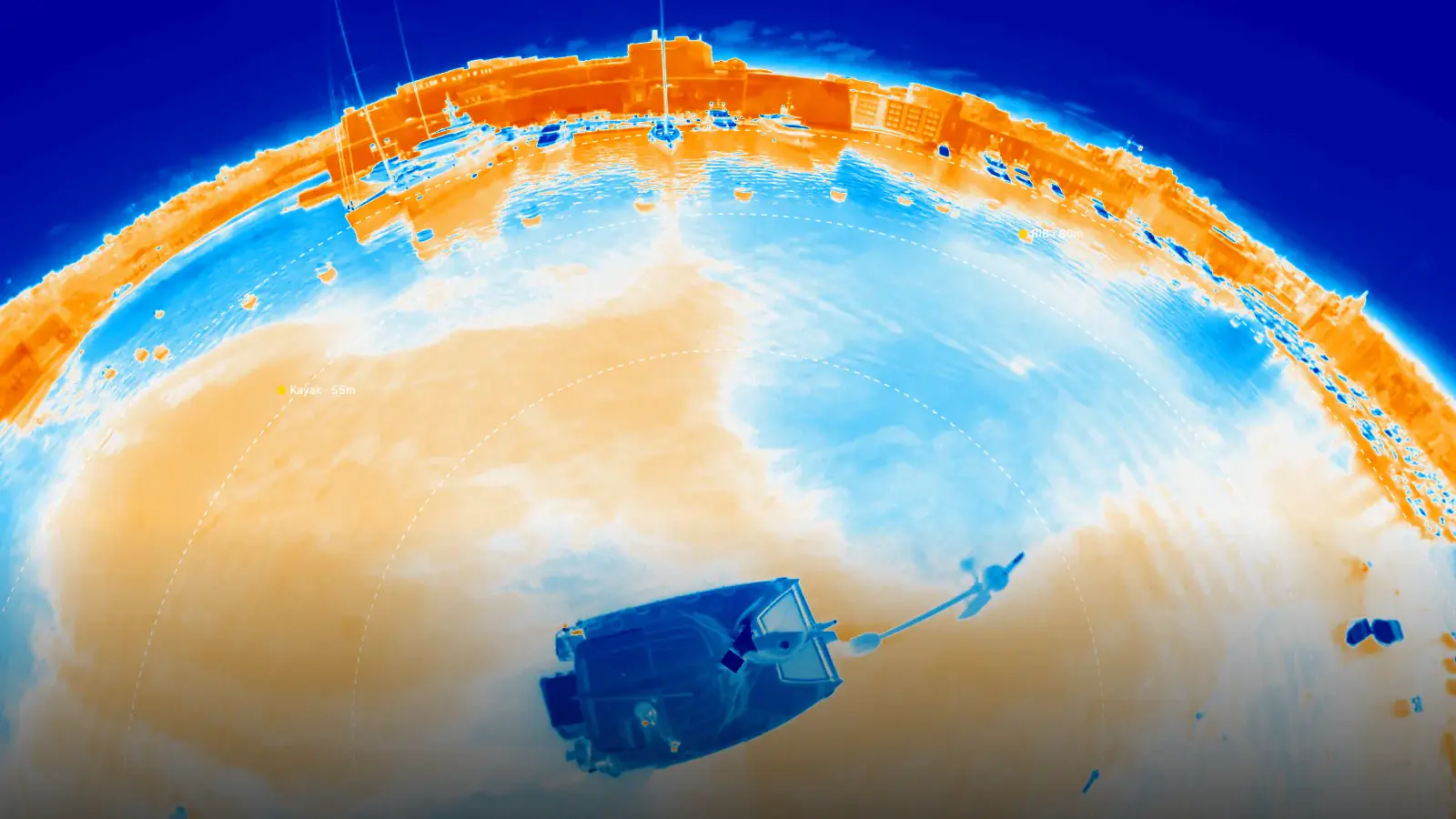 Thermal 360 degree frame of a harbour approach, with RAD range rings and labels drawn over the water